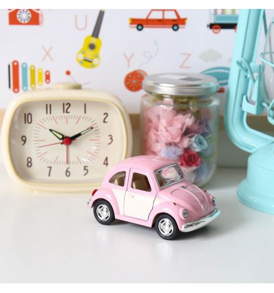 Voiture coccinelle Volskwagen rose pastel