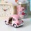 Voiture coccinelle Volskwagen rose pastel