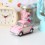Voiture coccinelle Volskwagen rose pastel