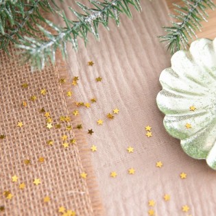 Confettis métallisés étoiles dorées