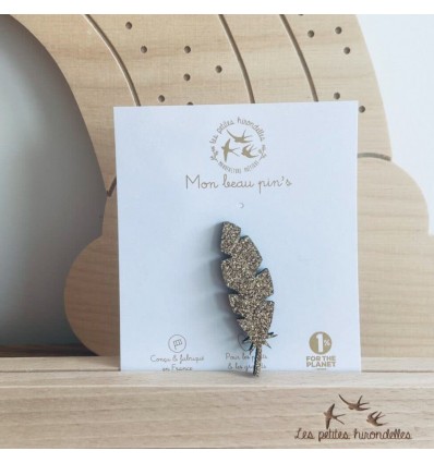 Pin's Plume dorée à paillettes - Les Petites Hirondelles